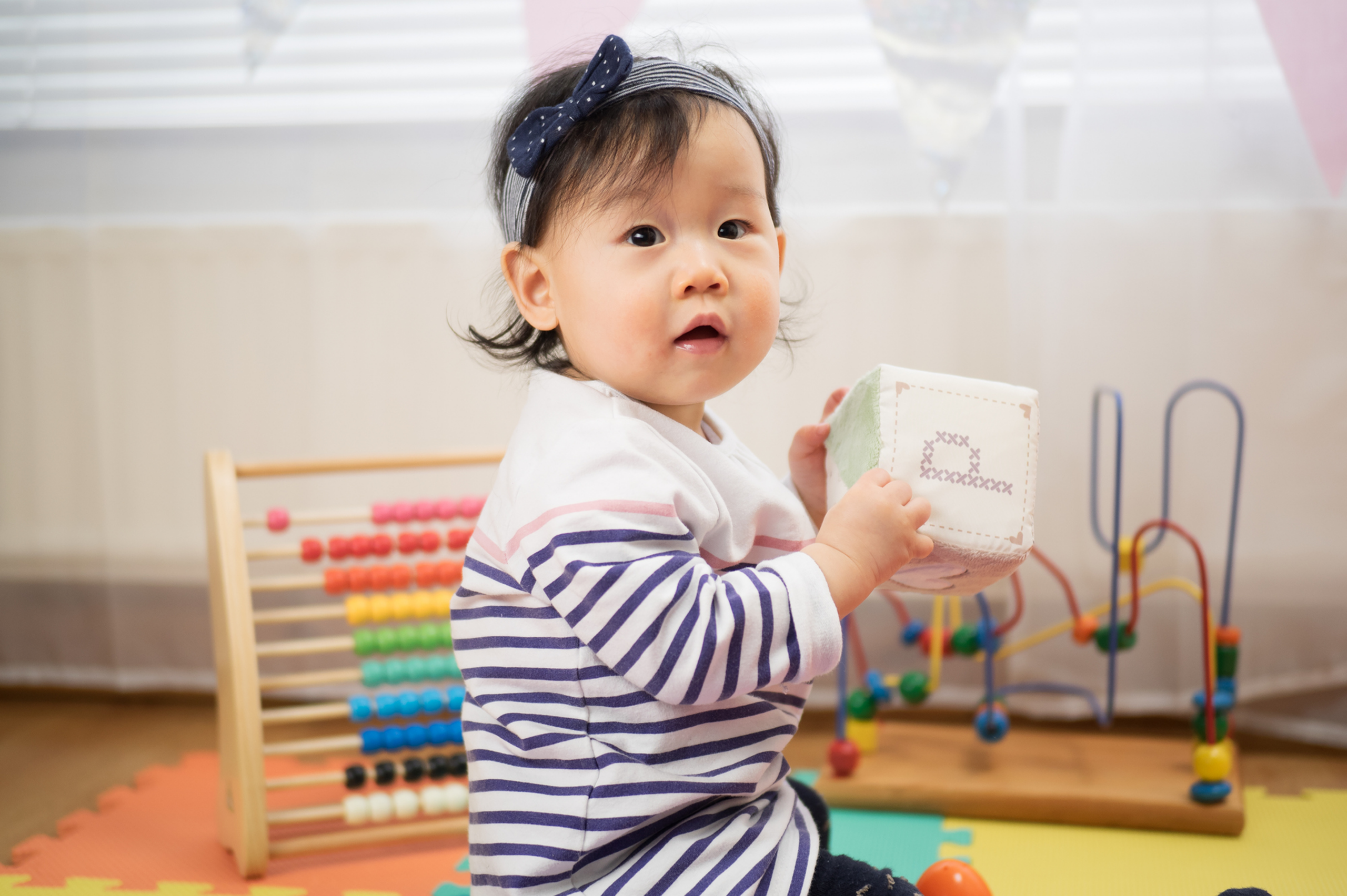 Baby Playing With Puzzle